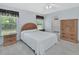 Inviting bedroom with windows, neutral tones, and cozy decor at 25305 Mardon Cir, Paisley, FL 32767