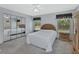Serene bedroom with mirrored closet doors and natural light at 25305 Mardon Cir, Paisley, FL 32767