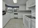 Bright kitchen with appliances and ample countertop space at 25305 Mardon Cir, Paisley, FL 32767
