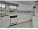 Bright kitchen featuring white cabinets and efficient layout at 25305 Mardon Cir, Paisley, FL 32767
