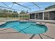 Private screened-in pool with patio and access to indoor living spaces at 25305 Mardon Cir, Paisley, FL 32767