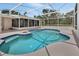Beautiful backyard pool with a screened lanai, perfect for relaxation at 25305 Mardon Cir, Paisley, FL 32767