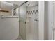 Shower with glass sliding doors and tile walls at 25305 Mardon Cir, Paisley, FL 32767