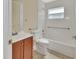Functional bathroom with vanity, and tub/shower combo with grab bars at 28045 Poinsettia Ave, Paisley, FL 32767
