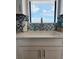 Kitchen sink featuring modern faucet and decorative herringbone tile backsplash at 2860 Ocean Shore Blvd # 5020, Ormond Beach, FL 32176