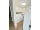 Convenient laundry room with washer, dryer, and storage cabinets at 2860 Ocean Shore Blvd # 5020, Ormond Beach, FL 32176