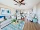 Inviting living room with comfortable seating and stylish coastal-themed decor at 2860 Ocean Shore Blvd # 5020, Ormond Beach, FL 32176
