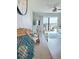 Cozy living room with a view of the balcony and the ocean beyond at 2860 Ocean Shore Blvd # 5020, Ormond Beach, FL 32176