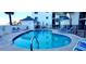 Community pool with crystal clear water, plenty of lounge chairs for relaxing poolside at 2860 Ocean Shore Blvd # 5020, Ormond Beach, FL 32176