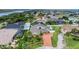 Aerial shot showcases the home's waterfront location, landscaping, and proximity to water at 3 Sea Dance Ter, Ormond Beach, FL 32176
