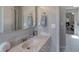 Bathroom with a marble countertop, neutral wall color and modern hardware at 3 Sea Dance Ter, Ormond Beach, FL 32176