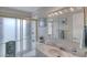 Bright bathroom featuring updated vanity and a glass-enclosed shower at 3 Sea Dance Ter, Ormond Beach, FL 32176