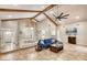 Open-concept floor plan with dining area, vaulted ceiling, wooden beams, and ample natural light at 3 Sea Dance Ter, Ormond Beach, FL 32176