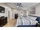 Main bedroom featuring a ceiling fan, neutral paint, and ensuite access at 3 Sea Dance Ter, Ormond Beach, FL 32176