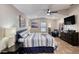 Large main bedroom with a ceiling fan and lots of natural light at 3 Sea Dance Ter, Ormond Beach, FL 32176