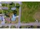 Aerial view of a single Gathering home with a privacy fence and new landscaping at 302 Lafayette St, Port Orange, FL 32127