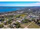 Panoramic aerial view of a residential neighborhood near a serene bay with stunning waterfront views at 302 Lafayette St, Port Orange, FL 32127