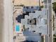 An aerial view showing parking and a pool area, with the beach just steps away at 3051 S Atlantic Ave # 1003, Daytona Beach, FL 32118