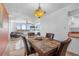 Open-concept room featuring a dining table, furniture, and water views at 3051 S Atlantic Ave # 1003, Daytona Beach, FL 32118