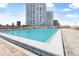 Enjoy lounging by the pool with plenty of chairs and an ocean view at 3051 S Atlantic Ave # 1003, Daytona Beach, FL 32118