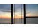 Beautiful sunset view from condo, featuring ocean and colorful sky at 3051 S Atlantic Ave # 1003, Daytona Beach, FL 32118