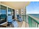 Inviting balcony with lounge chairs offering panoramic views of the beach at 3315 S Atlantic Ave # 1605, Daytona Beach Shores, FL 32118