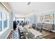 Bright dining room open to ocean views and modern furnishings and decor at 3315 S Atlantic Ave # 1605, Daytona Beach Shores, FL 32118