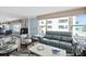Bright living room boasts contemporary furnishings, ocean views, and neutral decor at 3315 S Atlantic Ave # 1605, Daytona Beach Shores, FL 32118