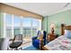 Relaxing ocean view from main bedroom with balcony access and comfortable seating at 3315 S Atlantic Ave # 1605, Daytona Beach Shores, FL 32118