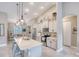 Bright kitchen features pendant lighting, stainless appliances, and counter seating at 3428 Saltee Cir, Ormond Beach, FL 32174