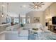 Open living area showcases kitchen, breakfast nook, and ample seating at 3428 Saltee Cir, Ormond Beach, FL 32174