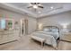 Spacious main bedroom featuring neutral paint color and a cozy sitting area at 3428 Saltee Cir, Ormond Beach, FL 32174