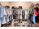 Organized walk-in closet with shelving and hanging rods for ample storage at 3428 Saltee Cir, Ormond Beach, FL 32174