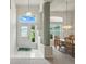 Bright foyer featuring tile flooring, high ceilings, and elegant lighting fixtures at 3776 Sweet Grove Ct, Port Orange, FL 32129