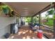 A large, screened patio with brick floors and outdoor seating, perfect for entertaining at 4204 Rocky Ridge Pl, Sanford, FL 32773