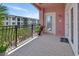 Balcony overlooking the community with wrought-iron railing at 424 Luna Bella Ln # 330, New Smyrna Beach, FL 32168