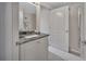 Bathroom featuring granite vanity and access to walk-in shower at 424 Luna Bella Ln # 330, New Smyrna Beach, FL 32168