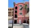Exterior view of the condos showcasing a well-maintained building and convenient garage access at 424 Luna Bella Ln # 330, New Smyrna Beach, FL 32168