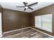 A bedroom featuring a ceiling fan, and a window with lots of natural light at 452 Casa Marina Pl, Sanford, FL 32771