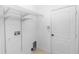 Laundry room featuring a metal shelf for storage and white colored wall at 452 Casa Marina Pl, Sanford, FL 32771