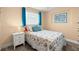 Inviting bedroom featuring a comfy bed, soft lighting, and serene atmosphere perfect for relaxation at 4638 Saxon Dr, New Smyrna Beach, FL 32169