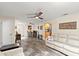 Open-concept living area showcases stylish flooring and a combination of living and dining spaces at 4638 Saxon Dr, New Smyrna Beach, FL 32169