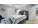 Relaxing bedroom with a comfortable bed, stylish decor, and ample closet space at 4791 S Peninsula Dr, Ponce Inlet, FL 32127