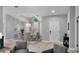 Dining room with modern lighting fixture, large window and seating for six at 4791 S Peninsula Dr, Ponce Inlet, FL 32127