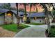 Charming single-story home with brick accents, mature trees and a beautiful lawn at 4791 S Peninsula Dr, Ponce Inlet, FL 32127