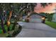 This home has a spacious garage with beautiful landscaped lawn and mature trees at 4791 S Peninsula Dr, Ponce Inlet, FL 32127