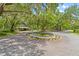 Picturesque estate grounds showcase a decorative fountain and an outdoor shelter at 4885 State Road 11, De Leon Springs, FL 32130