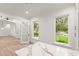 Well-lit pantry with marble countertop, custom cabinetry, and natural light at 4885 State Road 11, De Leon Springs, FL 32130