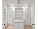 Custom pantry featuring built-in shelving, ample storage space, and marble countertop at 4885 State Road 11, De Leon Springs, FL 32130