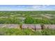 The community consists of multi-story townhomes with mature trees at 5060 Cypress Branch Pt, Oviedo, FL 32765